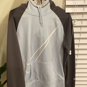 Light blue thermal fit Nike hoodie.